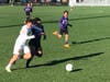 Ellington, in purple, and Weston battled it out for the Class M title at Trinity Health Stadium in Hartford Saturday afternoon.

