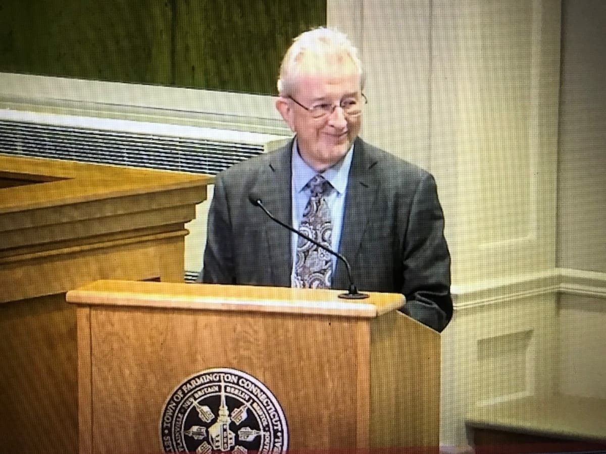 This video still from the Jan. 10 Farmington Town Council meeting shows former GOP registrar Edward 'Ed' Leary offering words of gratitude for being honored after more than two decades of service to the town.