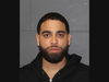 Miquel Narvaez, 31, of Waterbury, was charged by Southington police after they said Friday he backed into a police cruiser during a traffic stop and fled the scene Thursday afternoon.