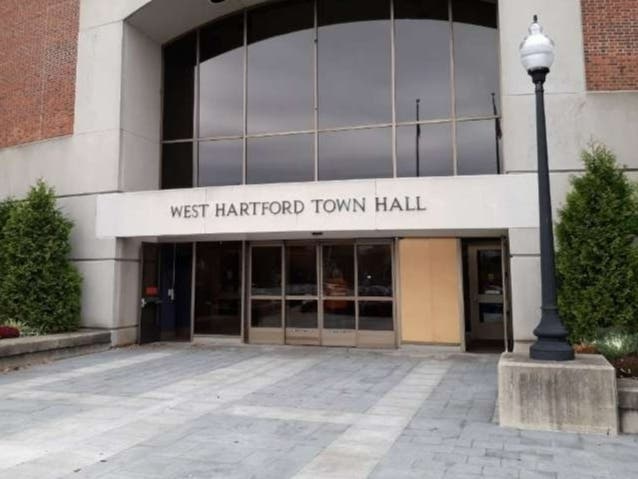 The West Hartford Town Council has voted to settle a lawsuit involving a woman who fell on a sidewalk in town back in 2019.