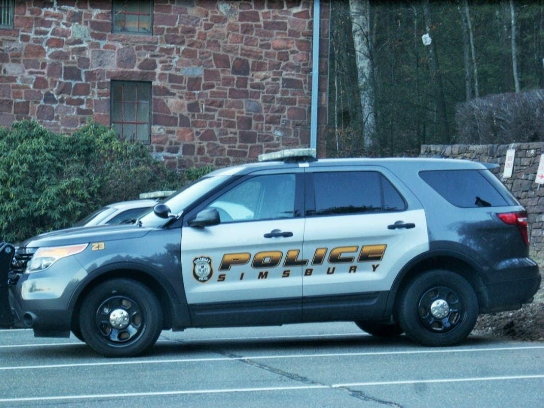 Police from Simsbury, Avon and Canton rushed to a Simsbury home due to a 'swatting incident' in which a phony shooting and hostage situation was reported.