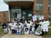 Family and friends of 5-year-old Romeo Pierre Louis gather at the Charter Oak International Academy in West Hartford Wednesday on the one-year anniversary of the boy's fatal collapse on the school playground. 