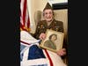 Farmington resident Leomonia 'Lee' Pappas, 102, shows her 'Quilt of Valor' and her World War II-era portrait in the U.S. Army Auxiliary.