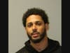Rocky Hill resident Euris Tejada, 30, was taken into custody in Rocky Hill after a massive search involving multiple police agencies in connection with a bank burglary in Norwich.
