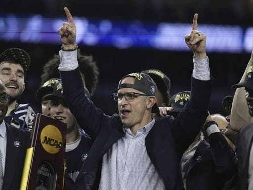University of Connecticut Men's Basketball Coach Danny Hurley, seen here celebrating the national title last April, will be part of a panel of UConn coaches at a special forum to take place at a Southington brewery later this month.