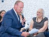 WFSB meteorologist and Connecticut broadcasting legend Scot Haney, left, is always a hit whenever he makes appearances at events, including Southington's Ms. Mulberry Gardens.