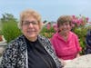 Middlewoods of Farmington resident Anne Shortier, left, was honored recently by a state organization for her role helping other residents adjust to life at the facility once they move in. At right is her good friend and fellow resident, Mary Ann Smith.