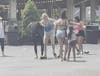 The Southington Police Department Friday issued another request for the public's assistance as they investigate a July 25 brawl, above, involving adult and juvenile females at Lake Compounce.