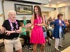Residents and staff enjoy a luau during Middlewoods of Farmington Camp Week last month. Pictured, left to right, are: resident, Carol Brennan, Middlewoods Director of Community Relations Ginny Brown and resident Mary Ann Smith.