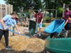 Volunteers from The Hartford spent the day at the University of Saint Joseph campus Monday commemorating Americorps' September 11 Day of Service adn Remembrance. They spruced up USJ's Gengras Center playground for special needs children.