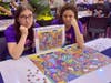 Karen Kavett of Los Angeles, Calif., left, and Farmington resident Elizabeth "EB" Caron, right, at the 2023 World Jigsaw Puzzling Championships last month in Spain. Kavett is a popular puzzling Youtuber while Caron is a University of Hartford professor.