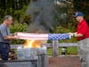 Army veteran Lee Wilson, left,  folds an unserviceable U.S. flag with Coast Guard veteran Jon Blume for placement in the newly built U.S. Flag Retirement Platform on Oct. 14.
