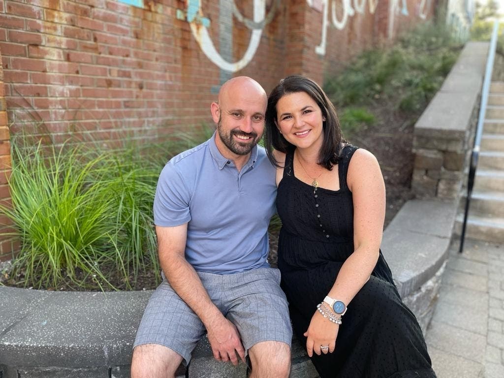 Hailey Handzel, right, has opened up a new window services business in West Hartford. She's with her husband, Lukasz Handzel, left.