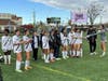 It was a good season for the Notre Dame-Fairfield girls' soccer team, though they came up short against St. Joseph of Trumbull. Here, the team receives the runner-up plaque from the CIAC.