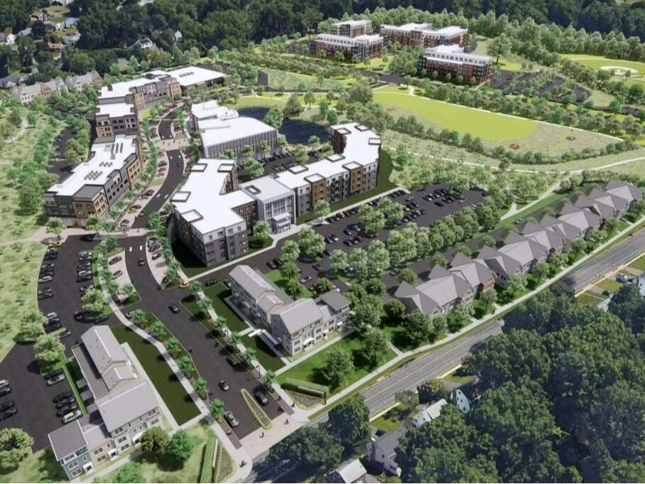 Plans for a massive development on the site of the old University of Connecticut site in town were discussed at a special zoning/wetlands board hearing Wednesday, with testimony taking so long, the hearing was extended to Monday, Dec. 11.