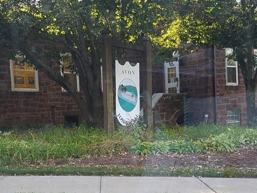 The Town of Avon has settled with a former doctor who sued the town over allegations he was falsely accused of sexual assault back in 2014.