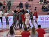 No, this is not a game-winning buzzer-beater from Sacred Heart. Rather, its Sacred Heart senior Tommaso Ferraresi's teammates mobbing him after he got engaged in the middle of 'Senior Day' ceremonies prior to the game Feb. 24.