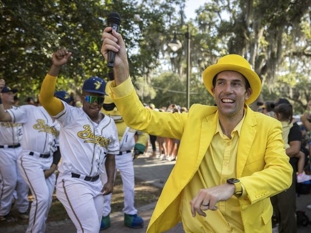 Savannah Bananas owner Jesse Cole emcees a pregame parade and performance for the fans before the gates open June 7, 2022, in Savannah, Ga. Tuesday, he will speak at the University of Hartford in West Hartford/Hartford/Bloomfield.
