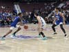 Bunnell senior Jordan Ricketts, left, dribble drives around a Lewis Mills defender, aided by a nice screen by Bunnell junior Jordan Pierce, right.