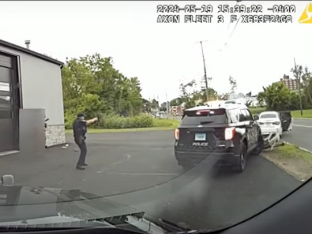 State investigators released footage, above, of East Hartford police opening up fire on a fleeing suspect in a white Infinity. The gray box obscures the image of two people who were knocked down by the vehicle, one of them carrying two children.