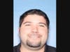 Newington resident David Laudati, 41, has been charged with being a fugitive in connection with a voyeurism investigation in Arizona. He was taken into custody Monday at a local residence.