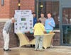 Greyson Goetz, Anka Plessinger-Izquierdo, and Christian Sillari staff a booth set up about their Peruvian school project at Henry James Memorial School in Simsbury recently.