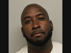 Devon Kempson-Cook, 37, of Hartford, was charged in connection with a liquor store holdup in Newington last month.