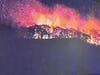 This image released Monday night by the Berlin Volunteer Fire Department shows Lamentation Mountain in flames. It is expected to be a multi-day fire, fire officials said.