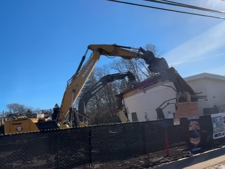 Whiting-Turner Contracting Co.​ crews put the finishing touches last week as they demolished the former Southington Public Library on Main Street. A new library was dedicated in December.