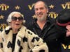 Farmington Station residents Faye Mastrobattista and Theodore Pires strut their stuff during a recent 'Red Carpet' celebration at the assisted living facility prior to awards season.