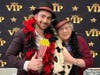 EnrichedLIFE Programming Assistant Ryan Young and Farmington Station resident Connie La Sala strut their stuff during a recent 'Red Carpet' celebration at the assisted living facility prior to awards season.
