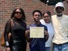 Middletown resident Malachi James poses with his family at middle school graduation earlier this year. His father, Thomas 'Christopher' James, right, has yet to regain consciousness from the serious crash that claimed his son, a family member said. 