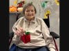 Farmington Station Senior Living recently shared its unique approach to arts programming that goes beyond experimenting with paint and clay. Here, resident Betty Formaggioni shows off her work. 