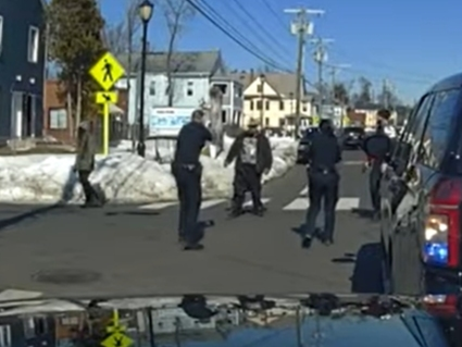 Hartford Police Department officer Joseph Magnano points his gun at 55-year-old Steven Jones of Hartford on Feb. 27. Jones was wielding a knife, and he was shot by Magnano after repeated warnings to drop the knife. Jones died on Tuesday from his injuries.