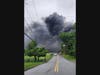 Smoke from Saturday's inferno was visible for miles throughout town.