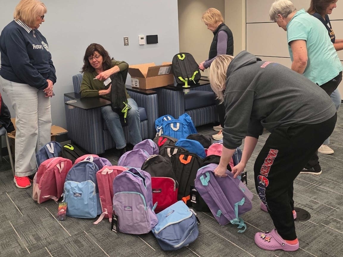 Volunteers assemble 'Bags of Hope,' care packages for foster children, during the Southington Rotary Club's community service event last year. On Thursday, June 4, the club is hosting its second-annual 'Bags of Hope' volunteer event to assemble care bags.