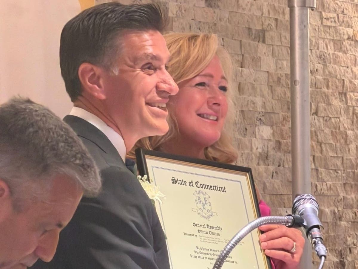 State Rep. Christopher Poulos, D-Southington, congratulates Southington resident and local community servant Dawn Miceli, who last month was officially awarded the 2025 Southington UNICO Gold Medal Award from the prominent local civic organization.