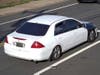Newington police are asking for the public's help identifying the driver of a vehicle that allegedly struck a police cruiser twice while fleeing an attempted traffic stop Tuesday. Above: An image of the vehicle, white Honda Accord.