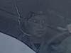 Newington police are asking for the public's help identifying the driver of a vehicle that allegedly struck a police cruiser twice while fleeing an attempted traffic stop Tuesday. Above: A surveillance image of the suspect.