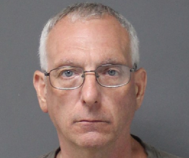 Kurt Hoss, 58, of Tolland, was charged with impersonation of a police officer and improper use of colored or flashing lights after police said he showed up to a medical call in Tolland Saturday offering help and claiming to be a federal officer.