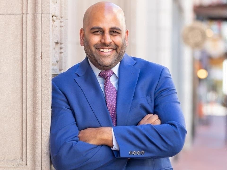 Hartford Mayor Arunan Arulampalam said he directed police to cite a law firm after advertisements appeared on city sidewalks without authorization. The law firm said it was to promote safety.