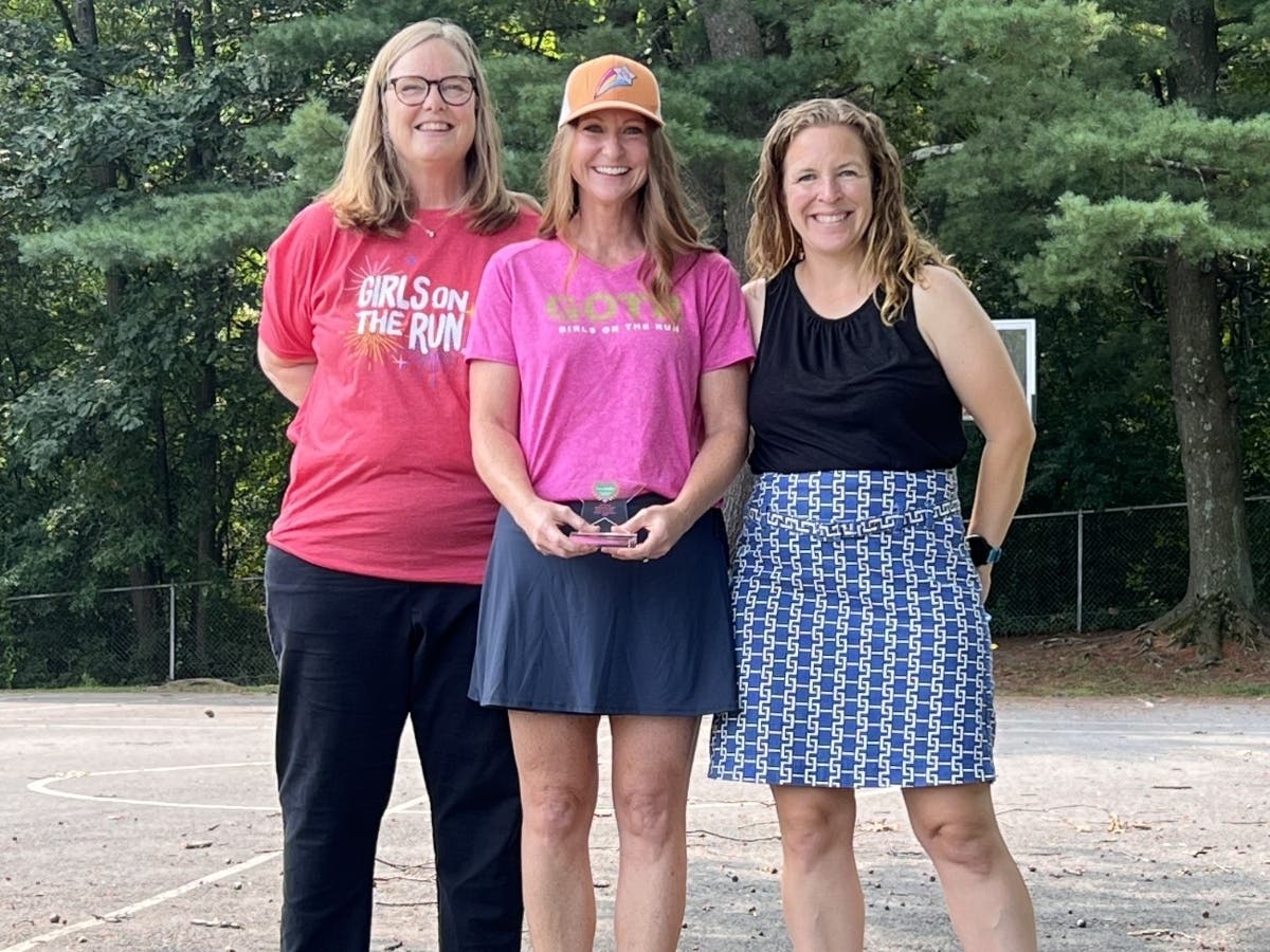 West Hartford resident Jennifer Byrne, center, was named a recipient of the "Girls on the Run International Remarkable Volunteer Award," an annual honor recognizing volunteers for their contributions to the organization