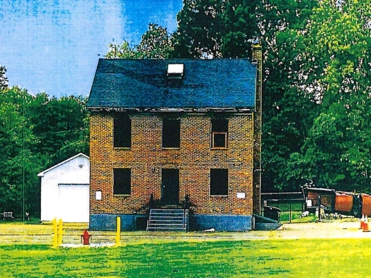 The Simsbury Fire District is seeking town approval to demolish its training building on Hopmeadow Street, above, and replace it with a new, modern training center.