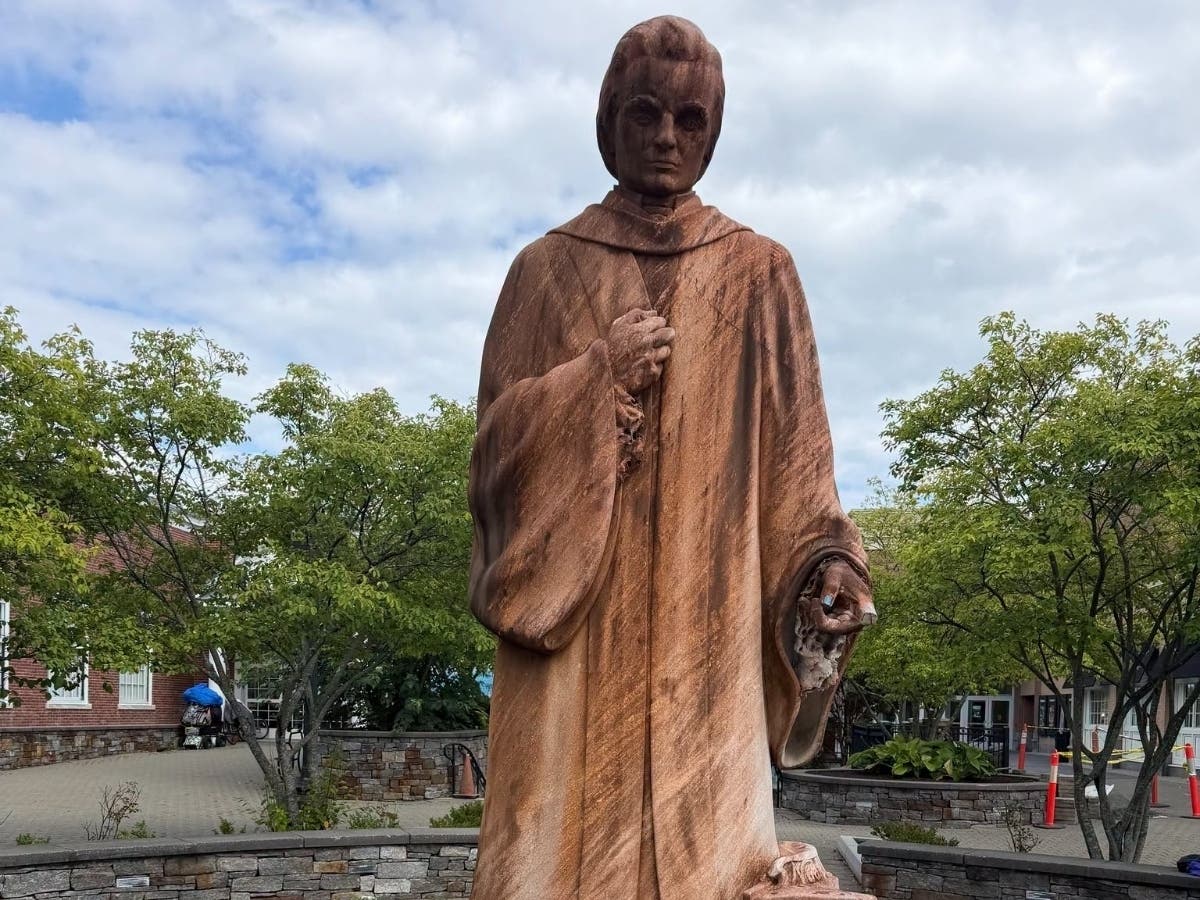 The town's iconic Noah Webster statue is being cleaned as part of ongoing maintenance work at Webster Walk.