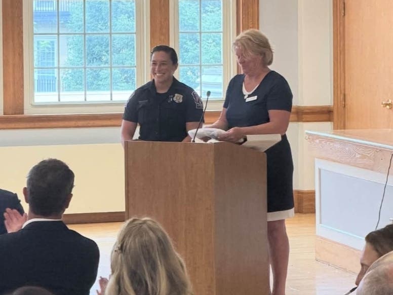 West Hartford police officer Lauren Rieger last week received the "Build No Fences Award" from the Bridge Family Center.