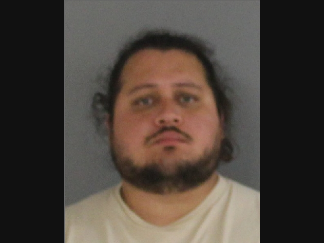 Luis Rodriguez-Rodriguez, 37, of Manchester, was arrested early Tuesday, Sept. 29, and charged with impersonation of a police officer and illegal possession of a weapon in a motor vehicle, according to Connecticut State Police.