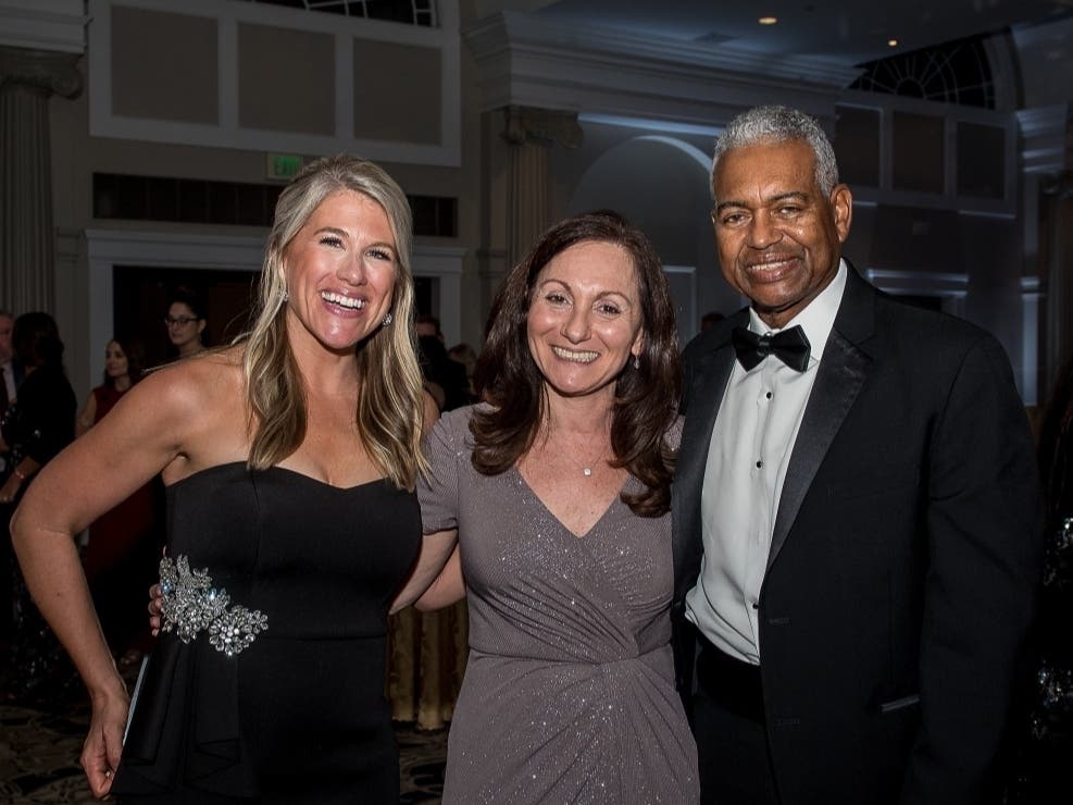 From left: WTNH Channel 8's Laura Hutchinson; Bett DeSantis (grateful patient); and WTNH Channel 8's Keith Kountz. The WTNH duo emceed the annual Trinity Health of New England gala on Saturday, Oct. 3.