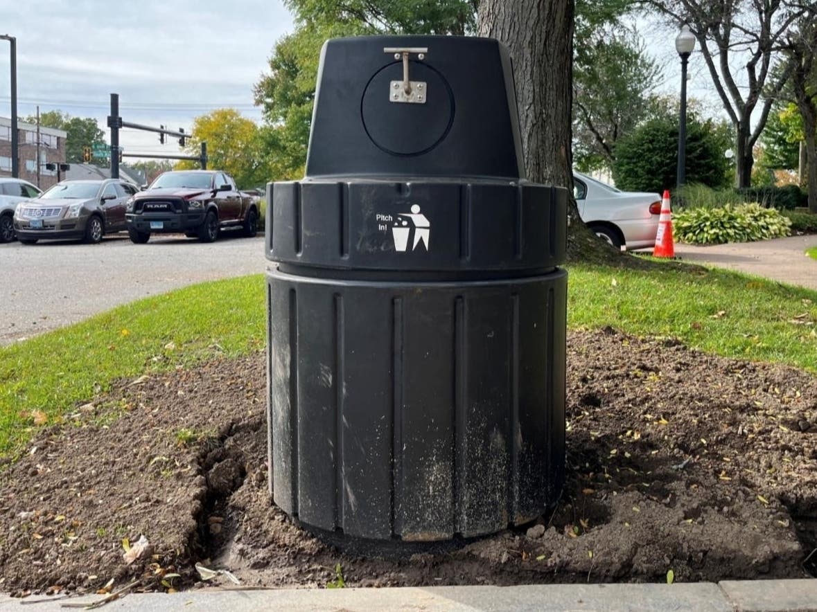 Above the ground, these new West Hartford public trash receptacles look like any other trash can. But they're different. In fact, they're bigger, with 60 percent of the receptacle actually underground. This, officials said, has many community benefits.