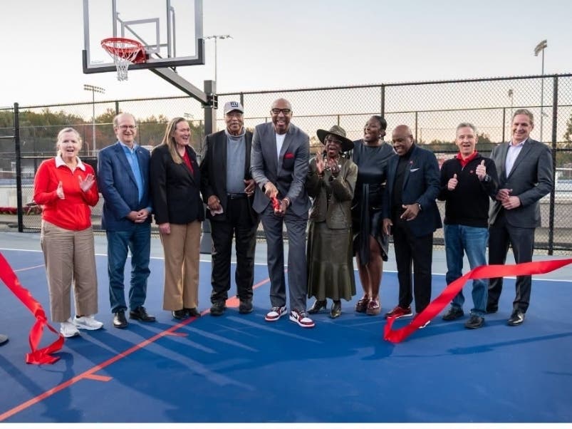 Iconic UHart alum Vin Baker, center, cut the ribbon last week on the University of Hartford's new $2.4 million athletics and recreation complex named in his honor. Baker, an NBA all-star during is playing days, is an assistant coach with the Miami Heat.