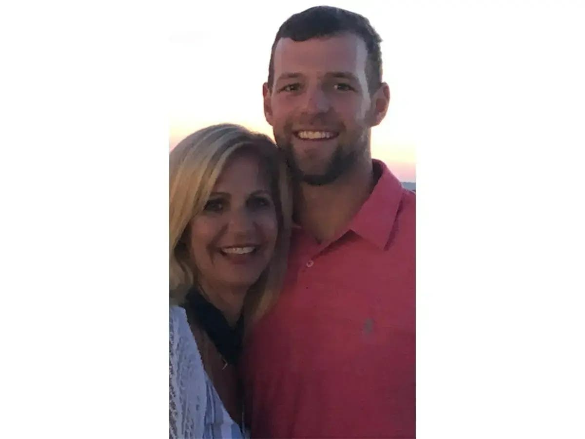 Regina Mullen of Manalapan with her son Kyle, who died during Navy "Hell Week" training in February. The House of Representatives last week passed an amendment to improve medical care and oversight for high-stress military training programs.